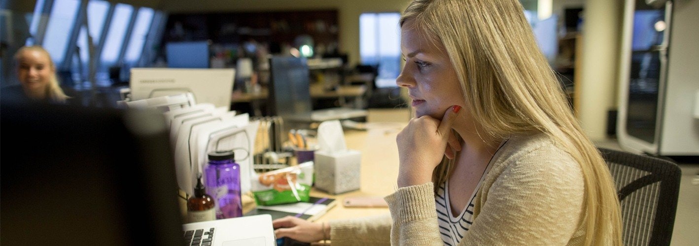 Mysti Eichinger working at her desk